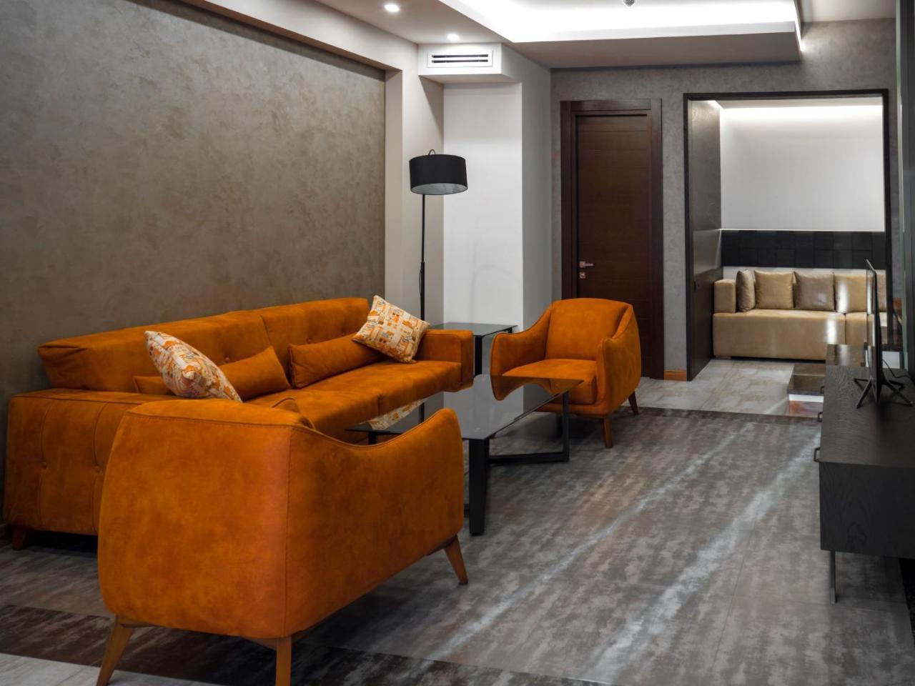 Aghababyan's Hotel Yerevan Bagian luar foto A 3D rendering of a living room