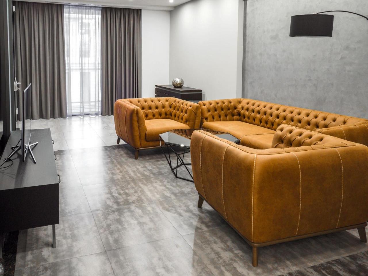 Aghababyan's Hotel Yerevan Bagian luar foto A 3D rendering of a living room
